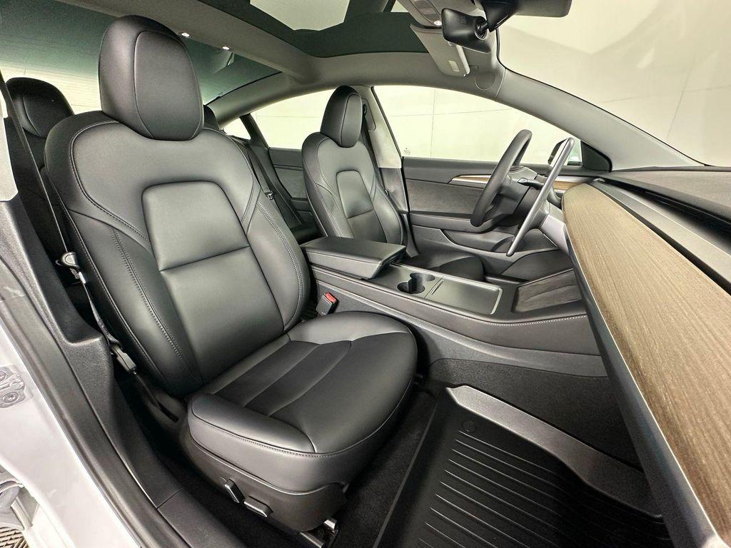 used 2023 Tesla Model 3 car, priced at $22,589