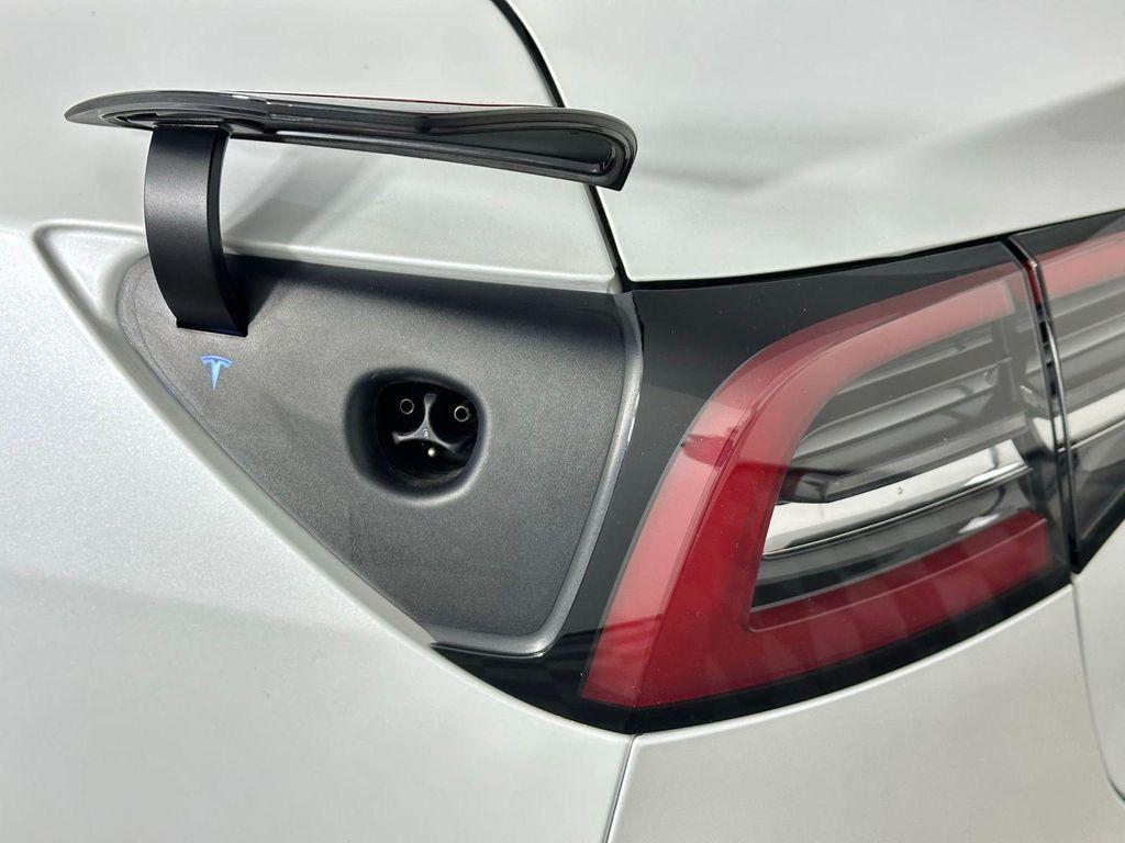 used 2023 Tesla Model 3 car, priced at $22,589