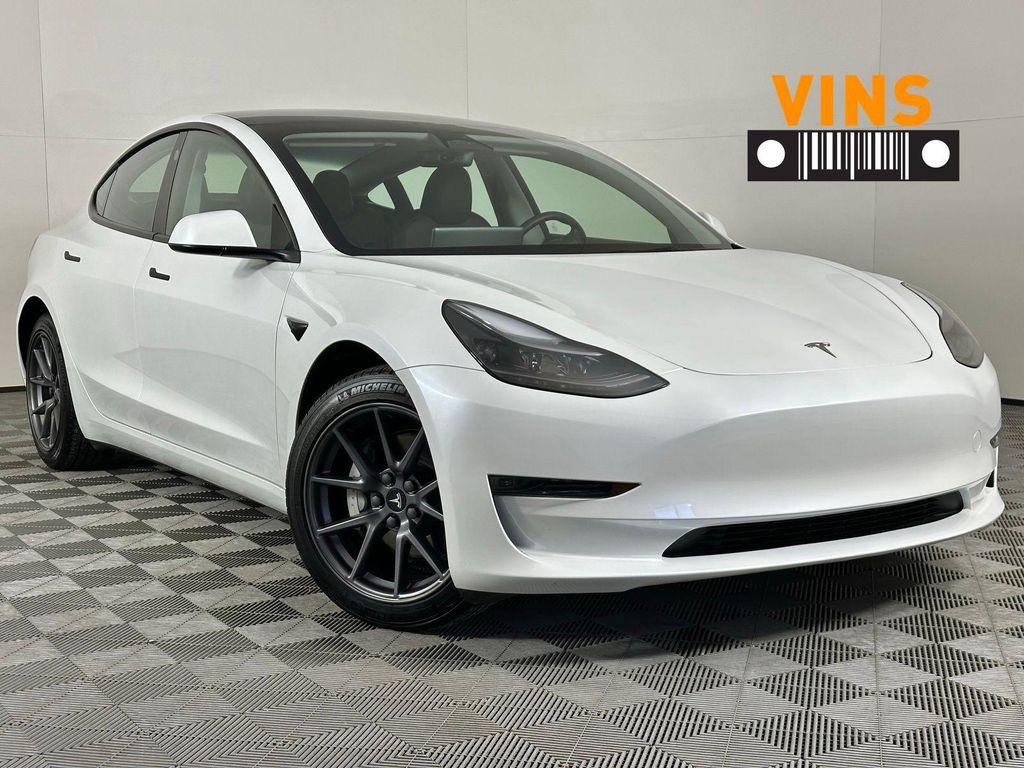 used 2023 Tesla Model 3 car, priced at $22,589