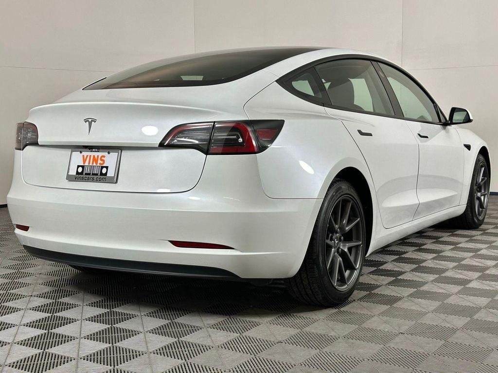 used 2023 Tesla Model 3 car, priced at $22,589