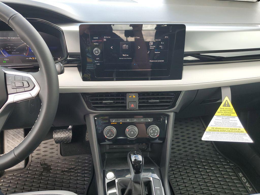 new 2025 Volkswagen Taos car, priced at $22,995