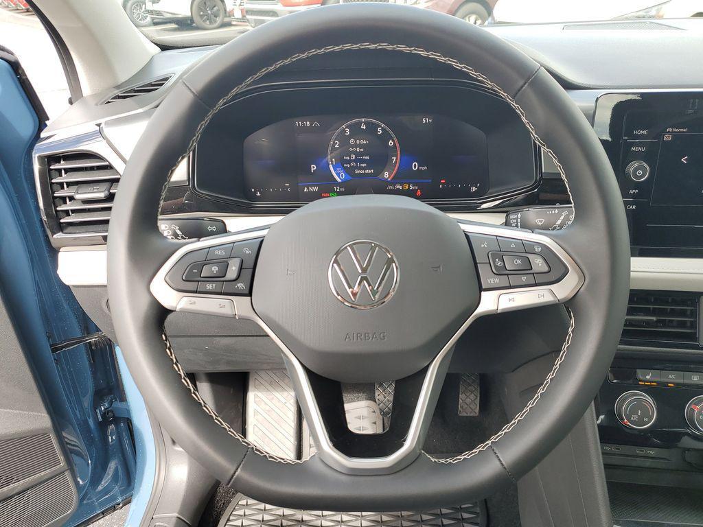 new 2025 Volkswagen Taos car, priced at $22,995