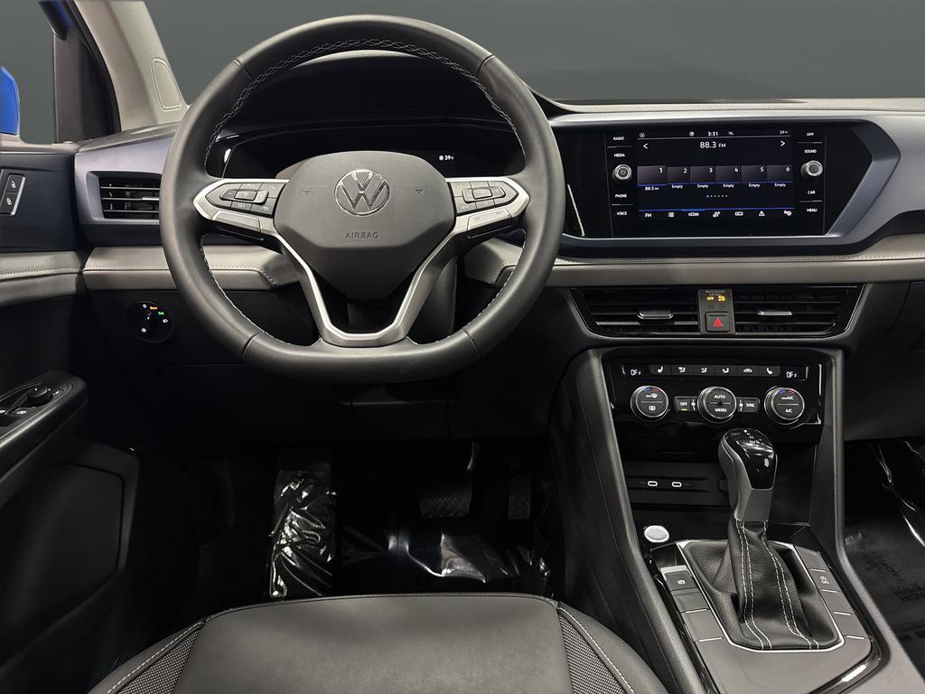 used 2024 Volkswagen Taos car, priced at $22,967