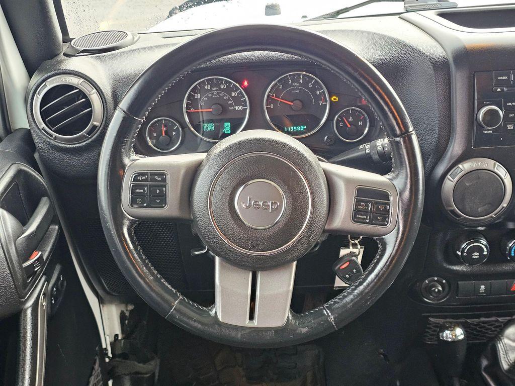 used 2016 Jeep Wrangler Unlimited car, priced at $15,278