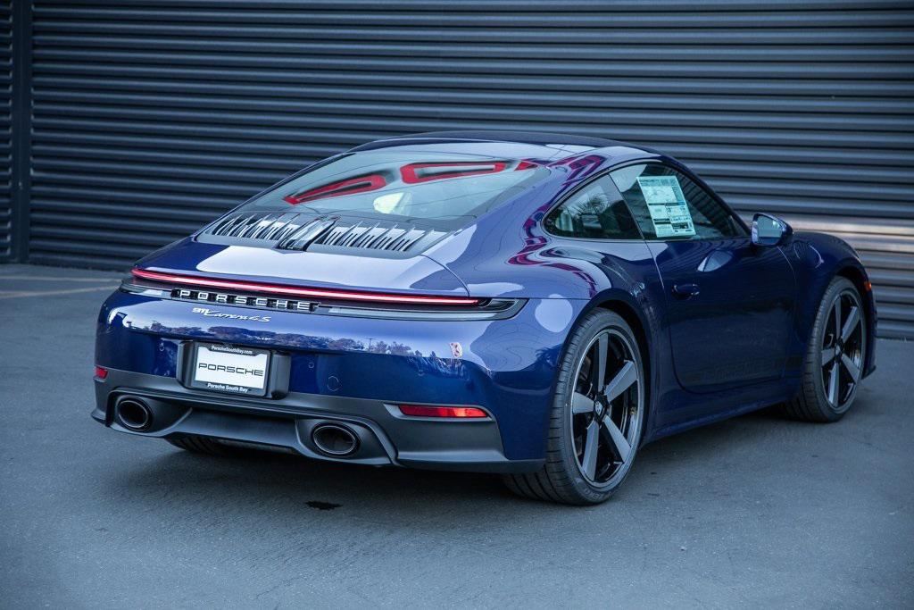 new 2026 Porsche 911 car, priced at $200,780