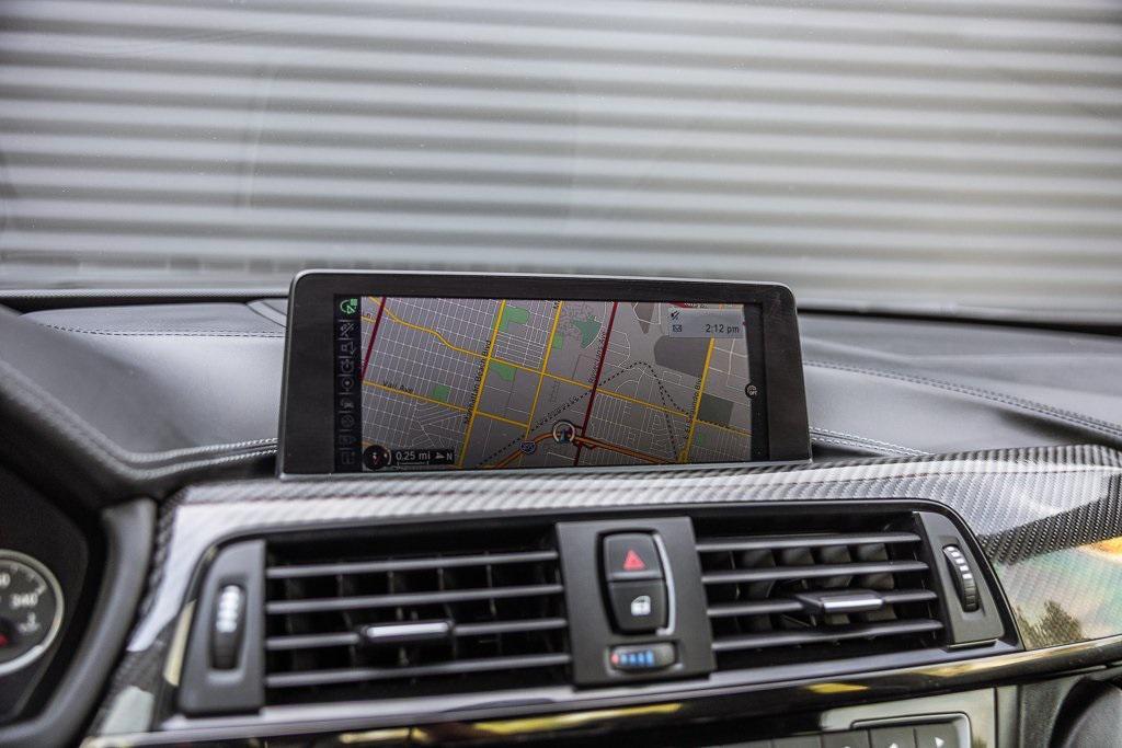 used 2015 BMW M4 car, priced at $34,998