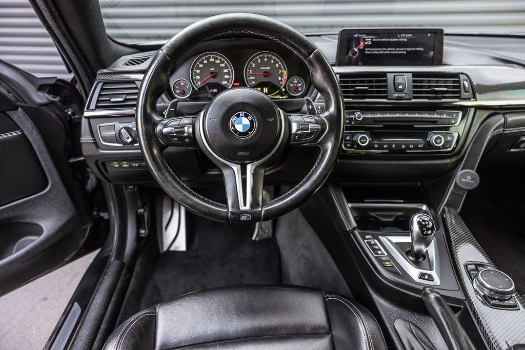 used 2015 BMW M4 car, priced at $34,998