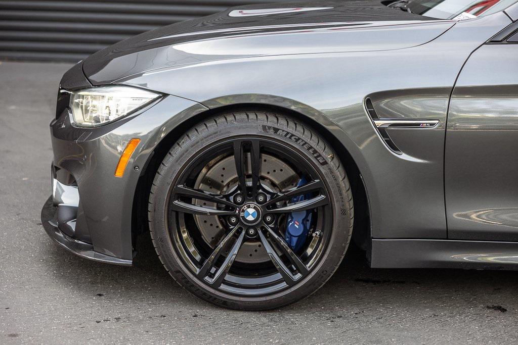 used 2015 BMW M4 car, priced at $34,998