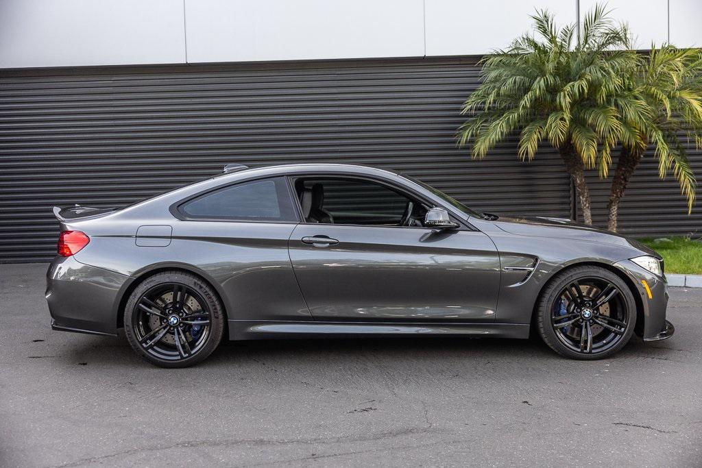 used 2015 BMW M4 car, priced at $34,998