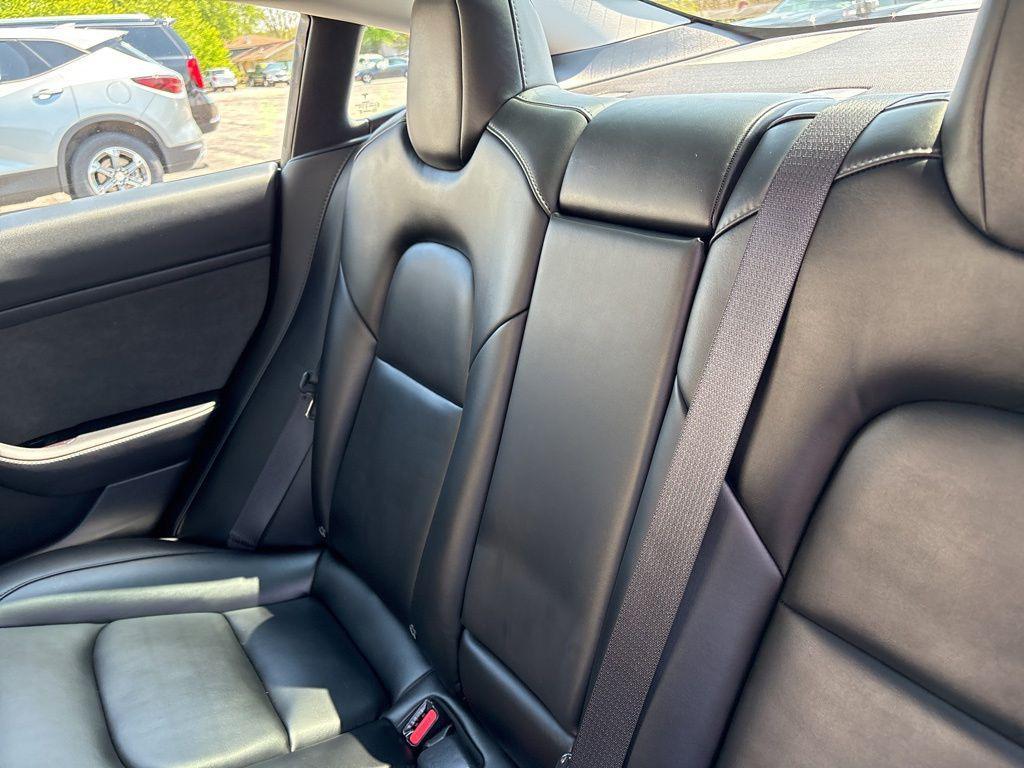 used 2023 Tesla Model 3 car, priced at $29,042