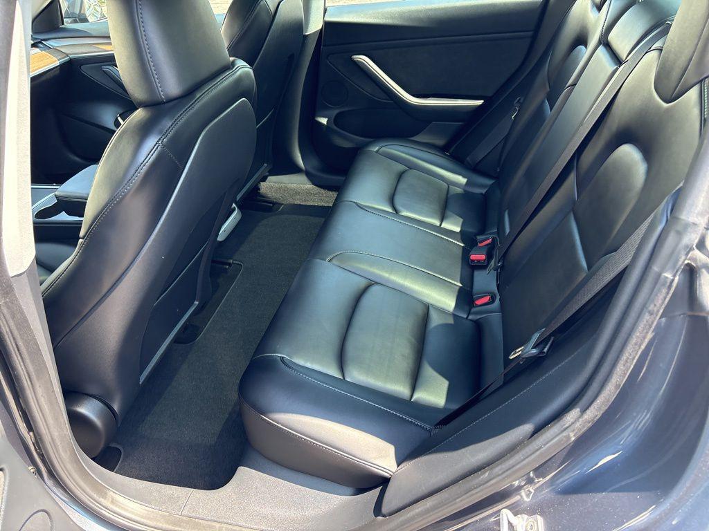 used 2023 Tesla Model 3 car, priced at $29,042