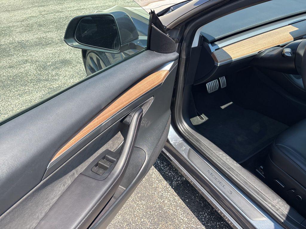 used 2023 Tesla Model 3 car, priced at $29,042