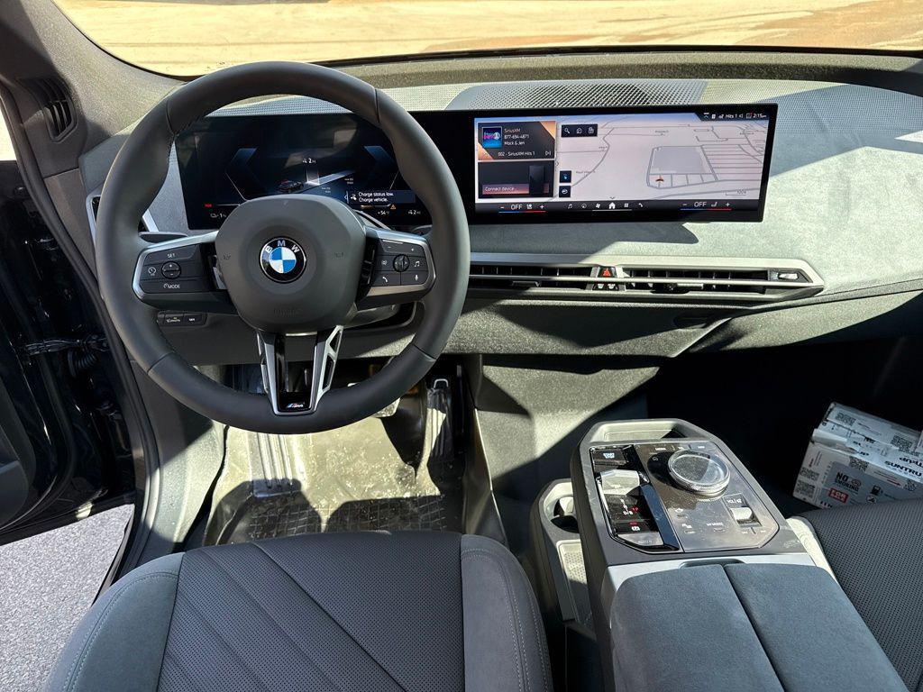new 2026 BMW iX car, priced at $89,370