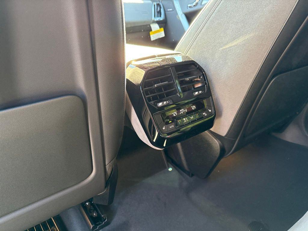 new 2026 BMW iX car, priced at $92,285