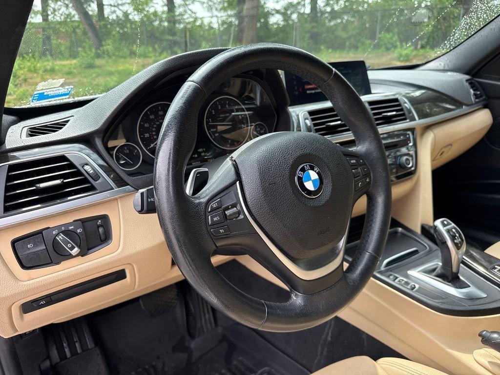 used 2018 BMW 330 car, priced at $13,989