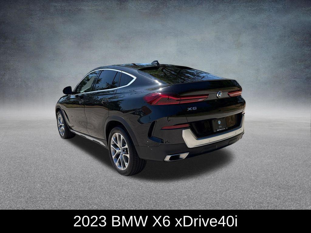 used 2023 BMW X6 car, priced at $55,959