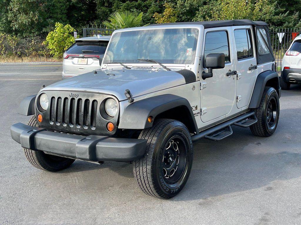 used 2009 Jeep Wrangler Unlimited car, priced at $9,999