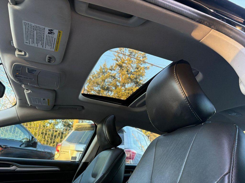 used 2016 Ford Fusion car, priced at $8,995