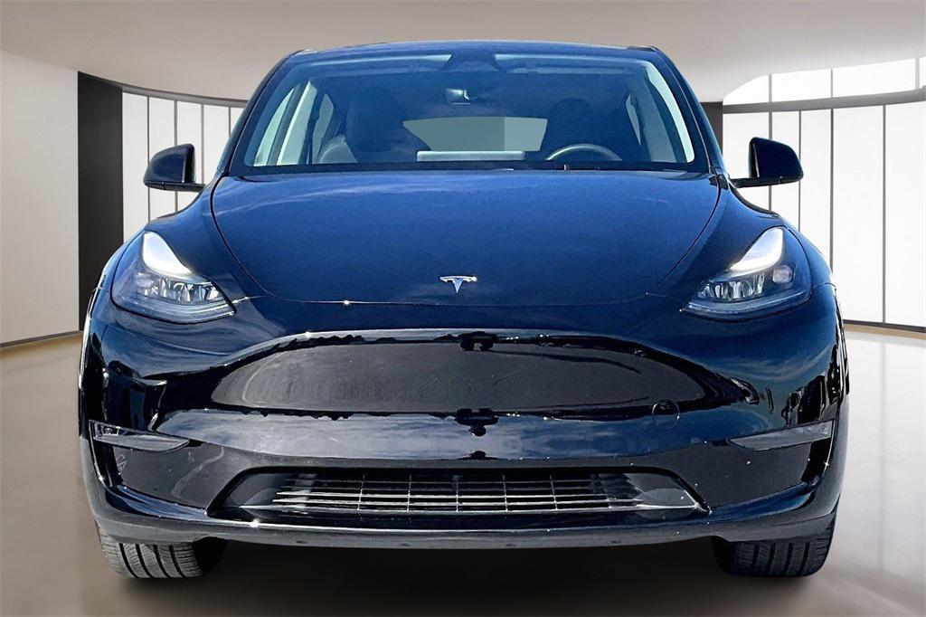 used 2025 Tesla Model Y car, priced at $38,329
