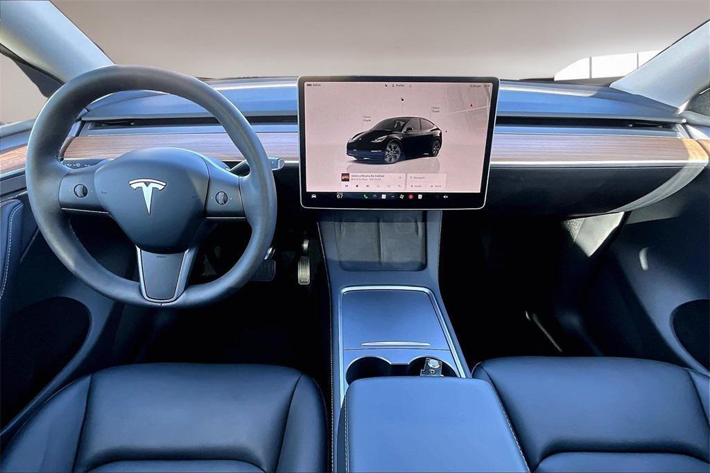 used 2025 Tesla Model Y car, priced at $38,329