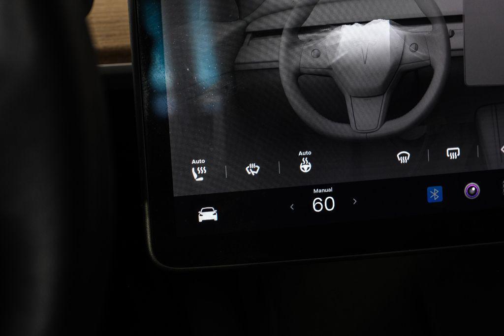 used 2023 Tesla Model 3 car, priced at $27,581