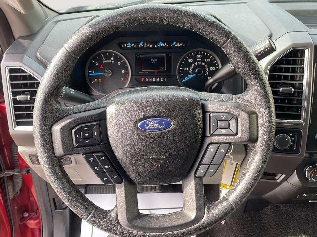 used 2015 Ford F-150 car, priced at $18,000