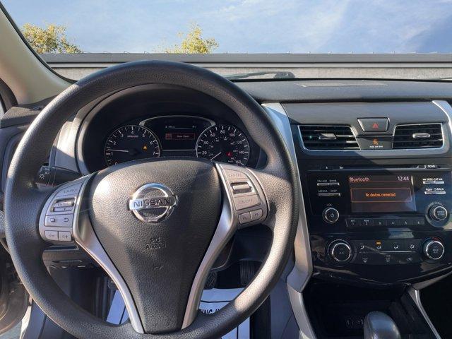 used 2014 Nissan Altima car, priced at $9,000
