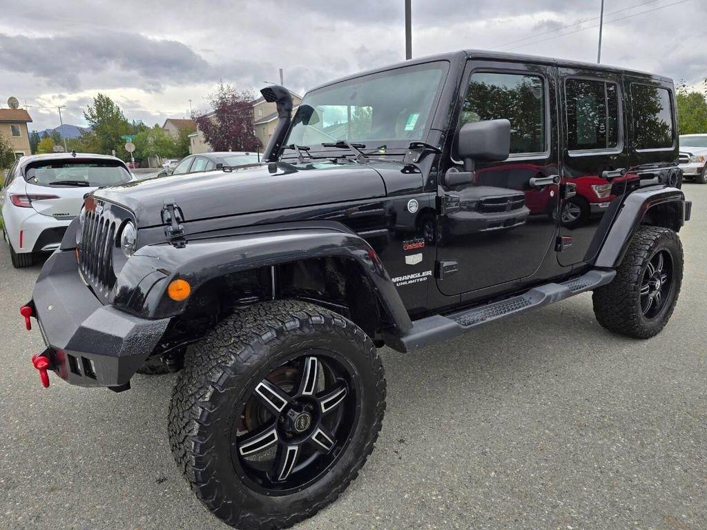 used 2011 Jeep Wrangler Unlimited car, priced at $16,355