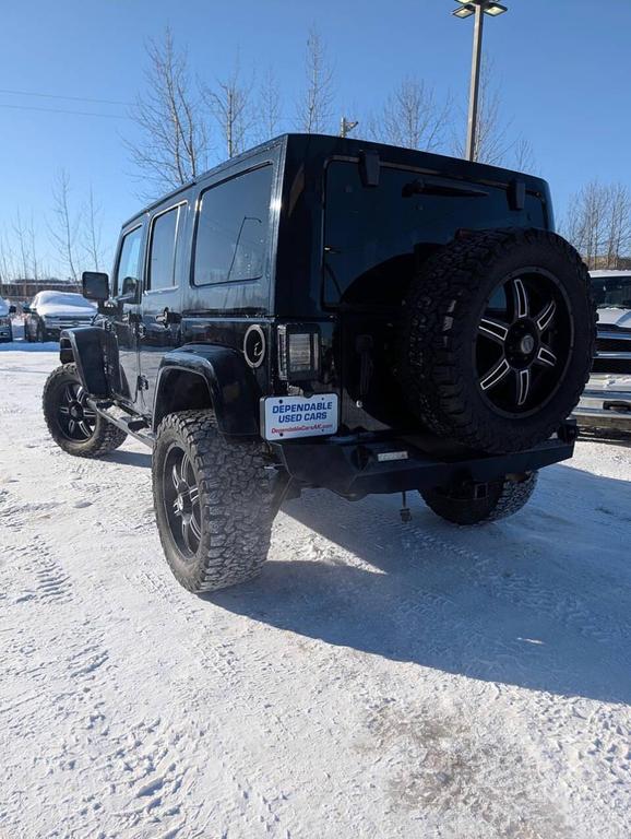 used 2011 Jeep Wrangler Unlimited car, priced at $16,325