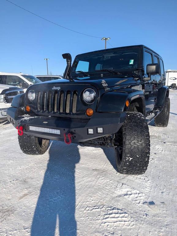 used 2011 Jeep Wrangler Unlimited car, priced at $16,325