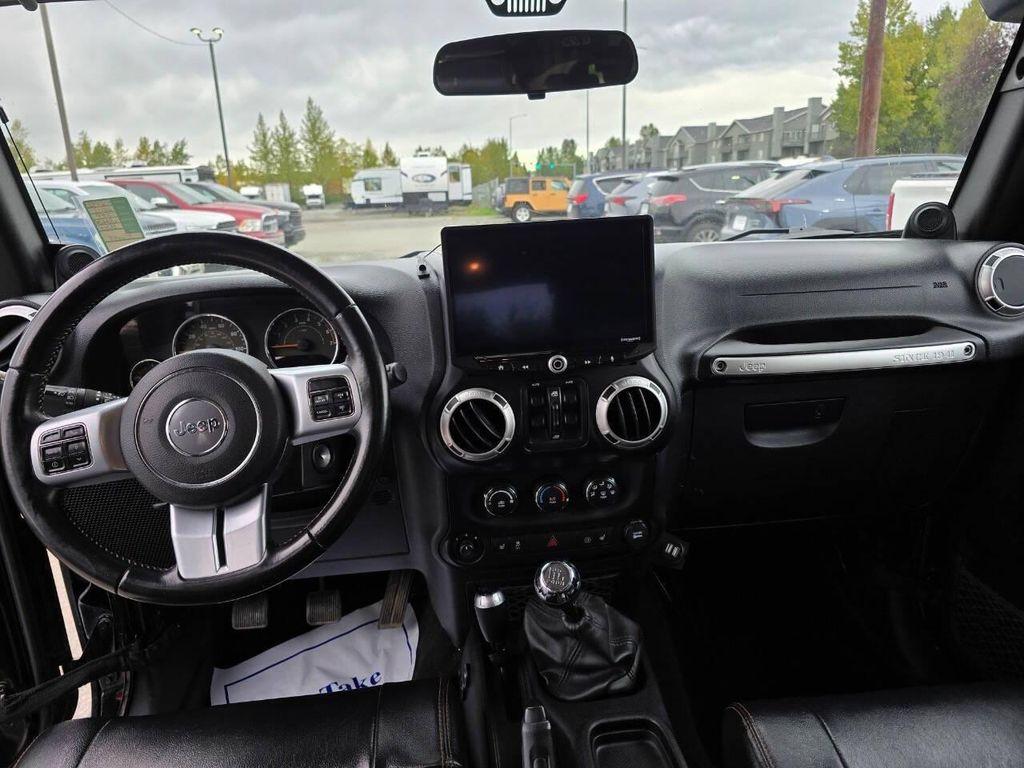 used 2011 Jeep Wrangler Unlimited car, priced at $16,355