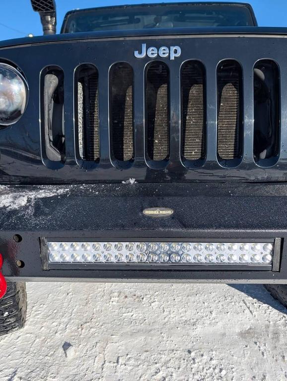 used 2011 Jeep Wrangler Unlimited car, priced at $16,325