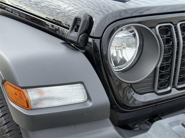 used 2024 Jeep Wrangler car, priced at $29,985