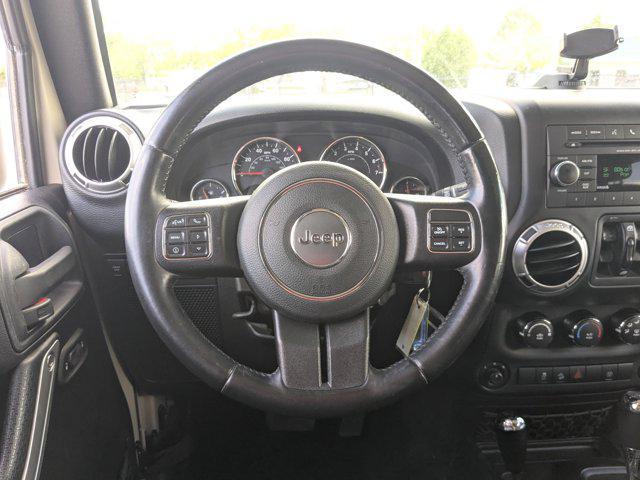 used 2016 Jeep Wrangler Unlimited car, priced at $24,641