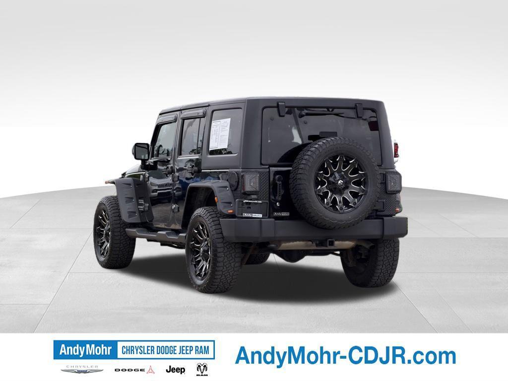 used 2013 Jeep Wrangler Unlimited car, priced at $16,655