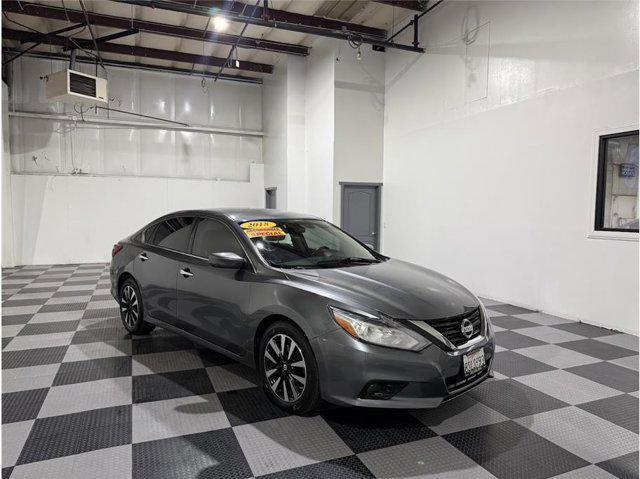 used 2018 Nissan Altima car, priced at $10,999