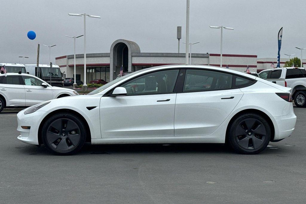 used 2023 Tesla Model 3 car, priced at $25,995