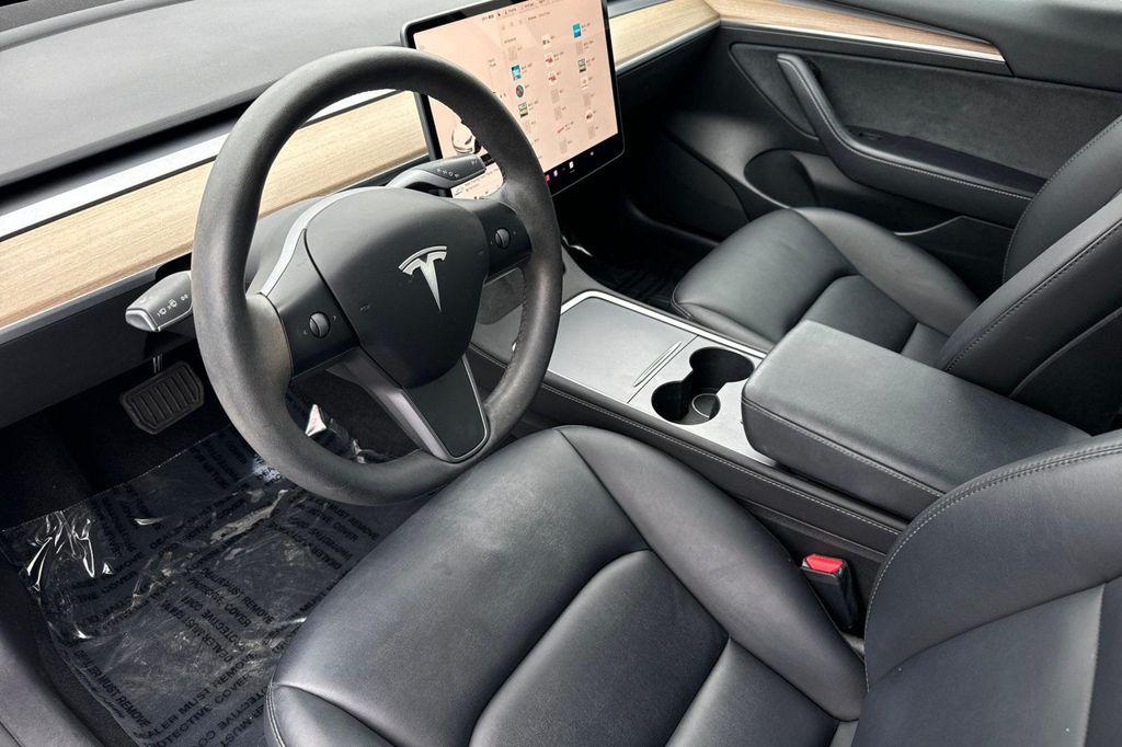 used 2023 Tesla Model 3 car, priced at $25,995