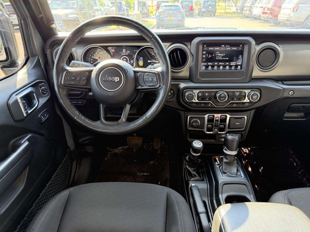 used 2023 Jeep Wrangler 4xe car, priced at $29,295