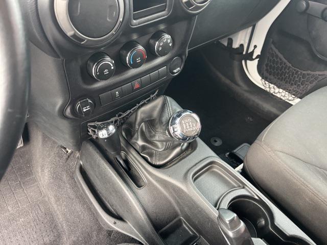 used 2015 Jeep Wrangler car, priced at $15,799