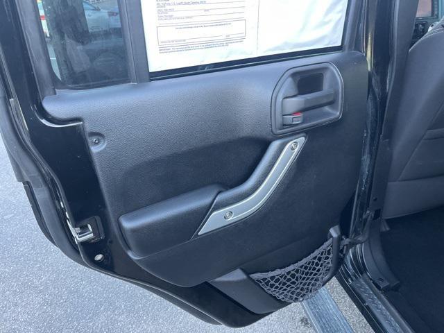 used 2014 Jeep Wrangler Unlimited car, priced at $16,278