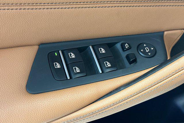 used 2023 BMW 530e car, priced at $33,384