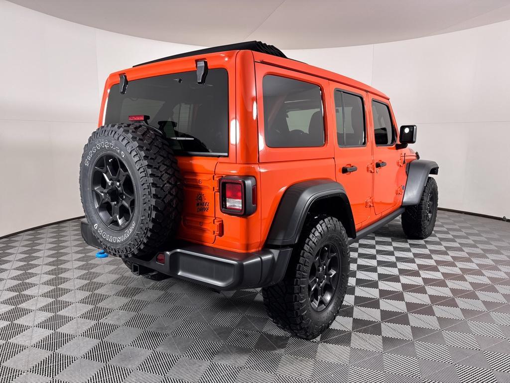 used 2023 Jeep Wrangler 4xe car, priced at $27,738