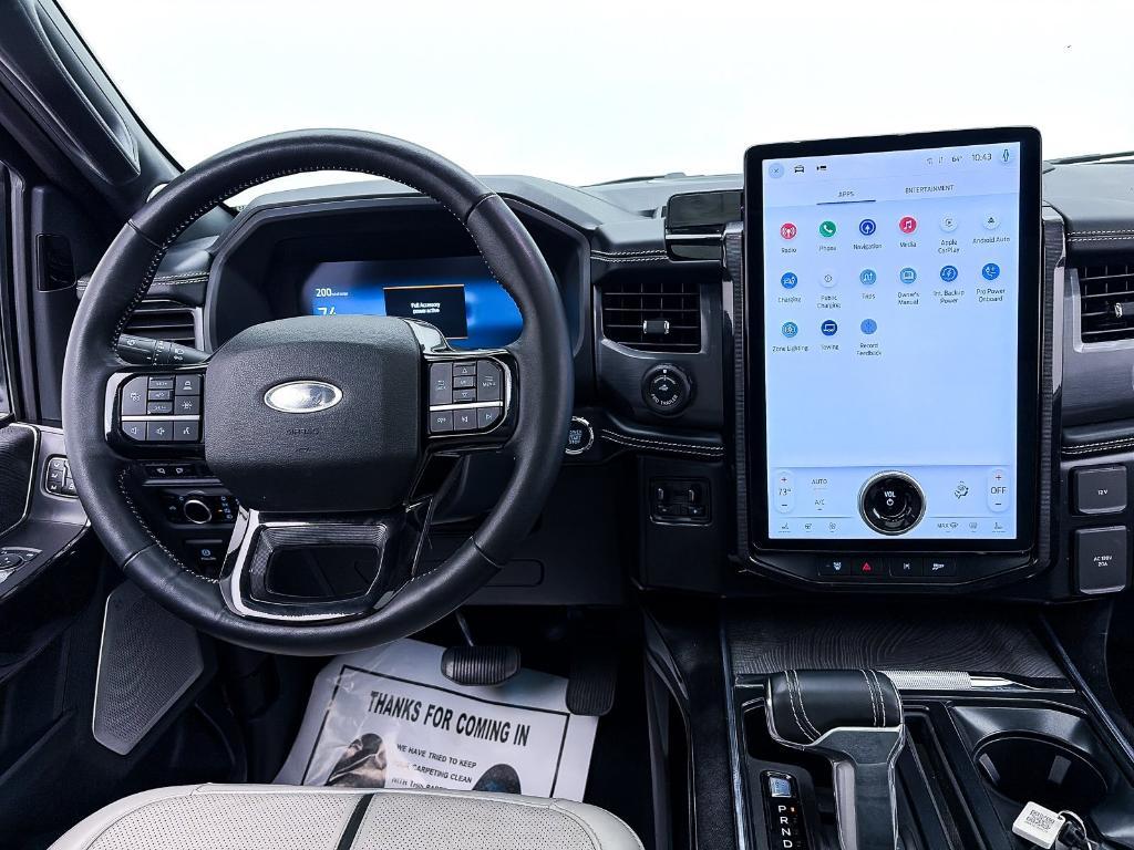 used 2023 Ford F-150 Lightning car, priced at $54,992