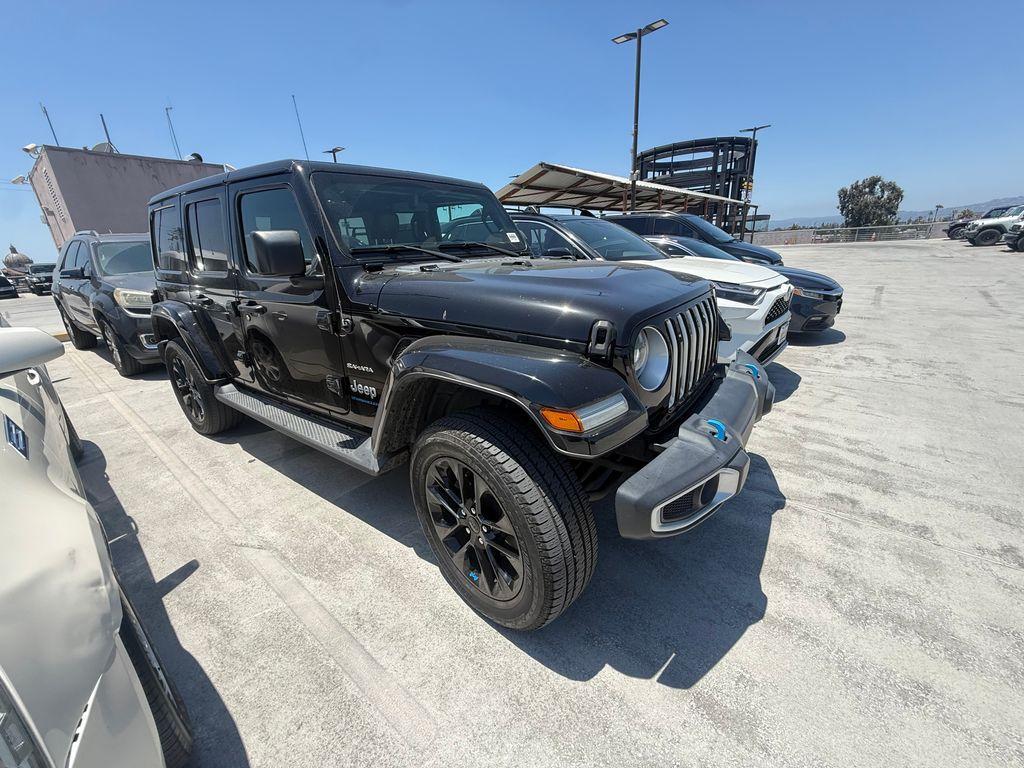used 2023 Jeep Wrangler 4xe car, priced at $23,304