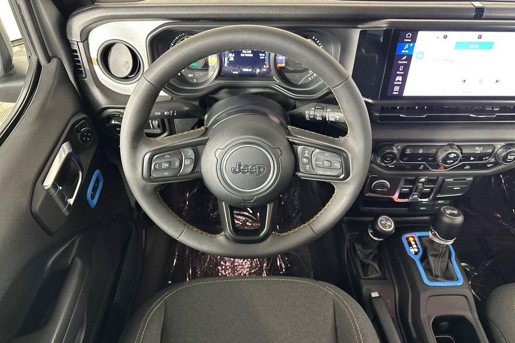 used 2024 Jeep Wrangler 4xe car, priced at $32,994