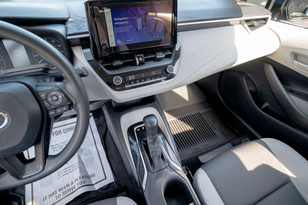 used 2024 Toyota Corolla Hybrid car, priced at $20,243