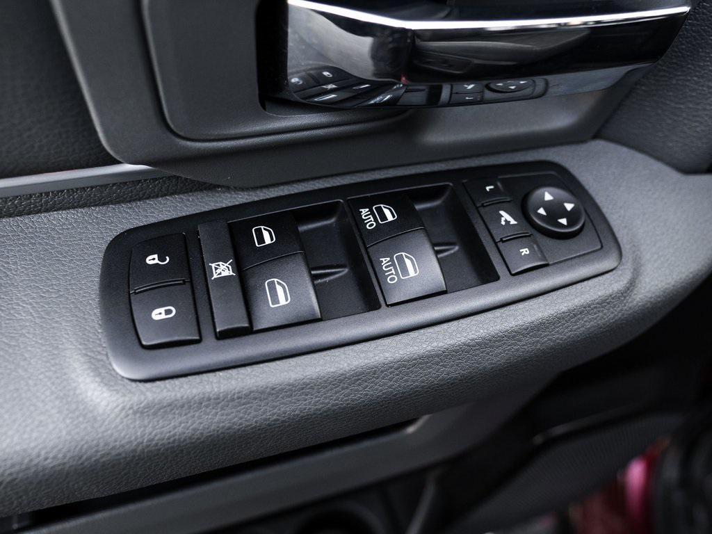 used 2018 Ram 1500 car, priced at $23,941