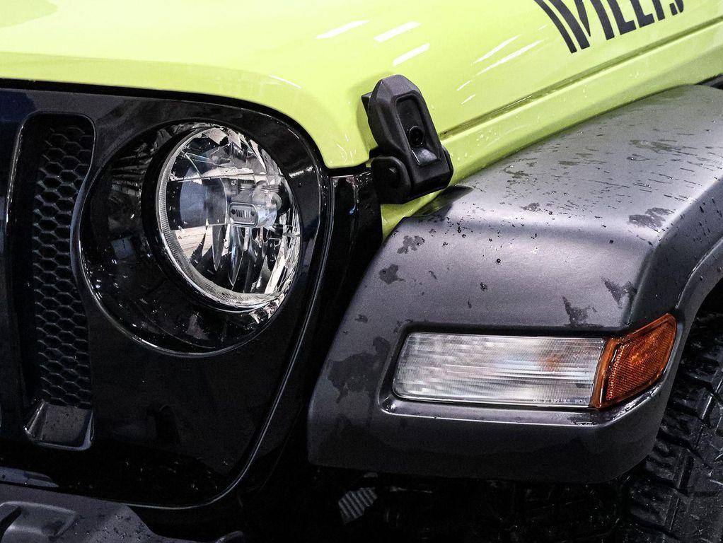 used 2023 Jeep Wrangler car, priced at $33,883