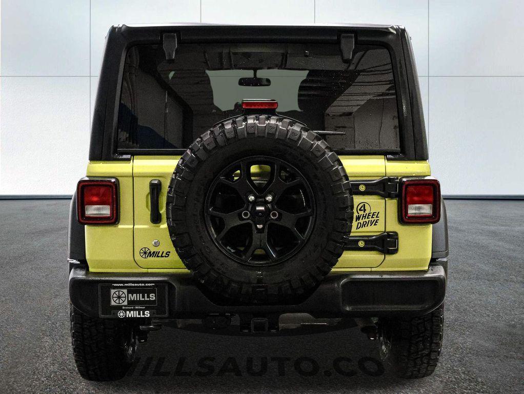 used 2023 Jeep Wrangler car, priced at $33,883